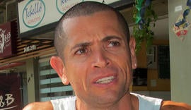 Fernando Deluz, a disc jockey, talks with The Associated Press about the night swimmer Ryan Lochte, of the United States, and teammates destroyed property at a gas station in Rio de Janeiro, Brazil, Aug. 19, 2016.