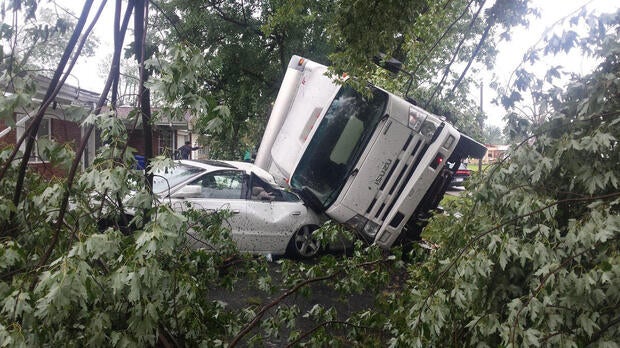 A truck was slammed against a car during severe weather in Kokomo, Indiana, on Aug. 24, 2016.