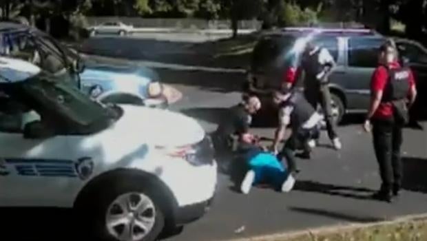 Keith Lamont Scott, 43, lies on the ground after he was shot by police in Charlotte, South Carolina, on Sept. 20, 2016, in this screen capture of video provided by attorneys for Scott’s wife Rakeyia Scott.