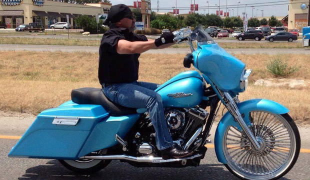 Bill Hall Jr. on his powder blue Harley 