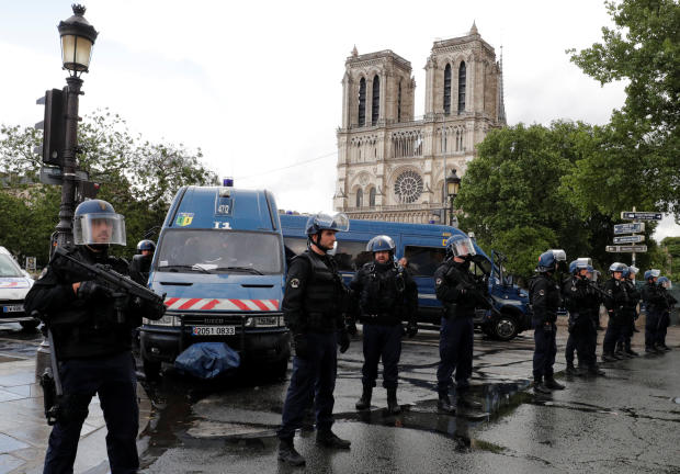 French police stand at the scene of a shooting incident near the Notre Dame Cathedral in Paris, France, June 6, 2017. 