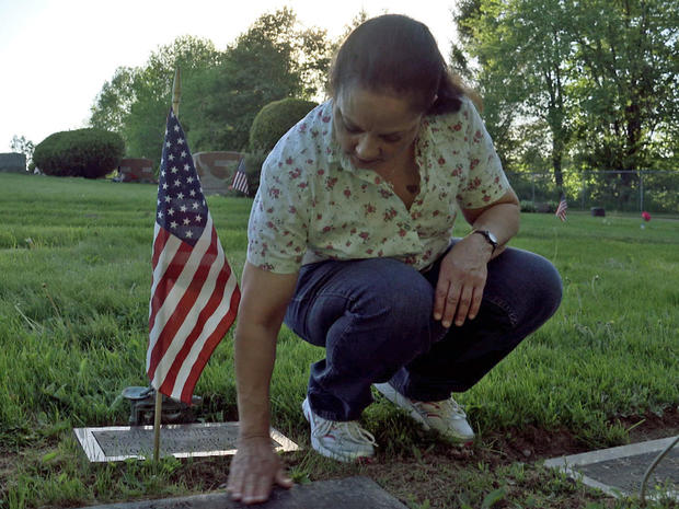 Rosalyn Grotton at her father's grave 