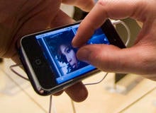 apple-introduces-iphone-fingers-closeup-ap-070629031595.jpg
