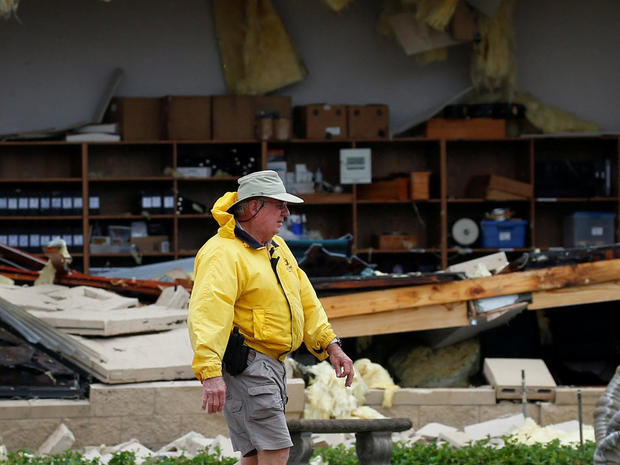 A man assesses damage to the First Baptist Church after it was hit by Hurricane Harvey in Rockport 