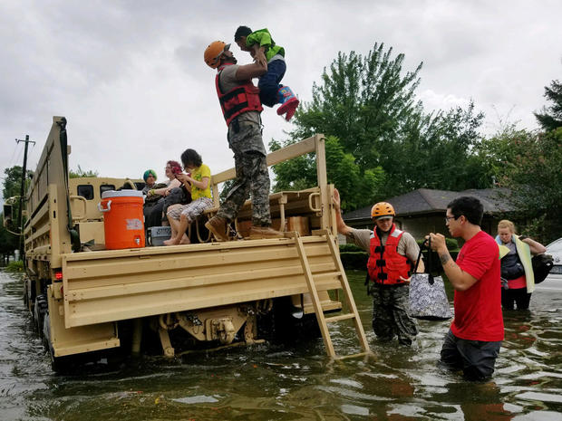 Handout photo of Texas National Guard soldiers aiding residents in heavily flooded areas from the storms of Hurricane Harvey in Houston 