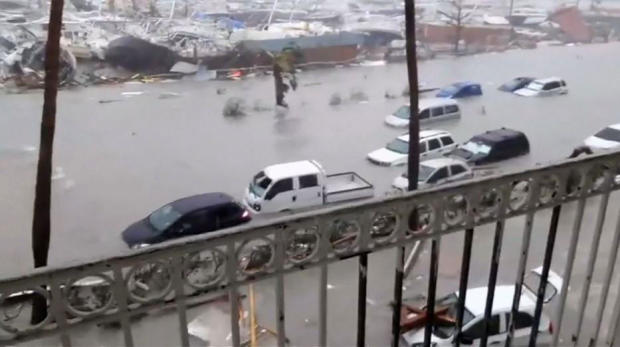 This image captured from amateur video shows cars partially submerged in floodwaters on the island of St. Martin as Hurricane Irma hit the Caribbean on Sept. 6, 2017. 