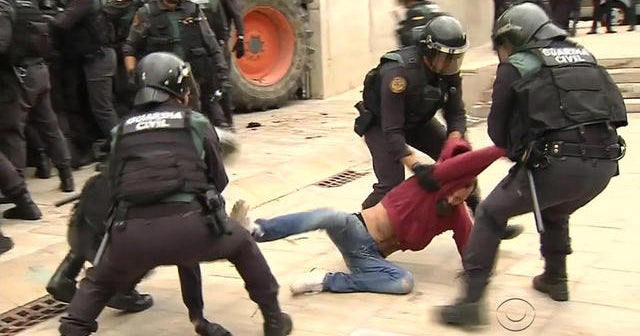 Crackdown on Catalans in Spain as they vote for independence
