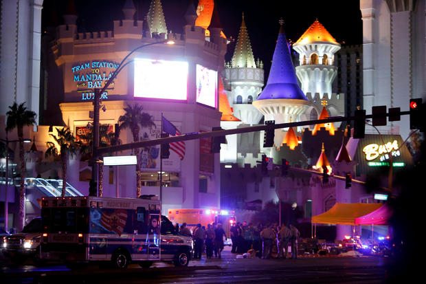 Las Vegas Metro Police and medical workers stage in the intersection of Tropicana Avenue and Las Vegas Boulevard South after a mass shooting at a music festival on the Las Vegas Strip in Las Vegas 