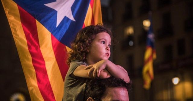 Unionists and separatists face off as Spain takes control of Catalonia