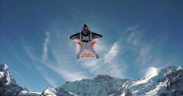 French daredevils leap from mountain and fly into plane