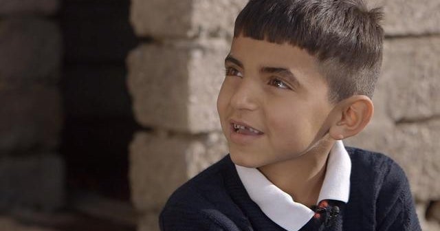 Iraqi boy says he lived with an American family during ISIS captivity