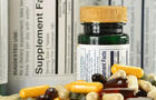 Composition with dietary supplements capsules and containers 