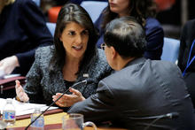 U.S. Ambassador to the United Nations Haley speaks to China's ambassador to the U.N. Zhaoxu before the United Nations Security Council vote for ceasefire to Syrian bombing in eastern Ghouta, at the United Nations headquarters in New York 