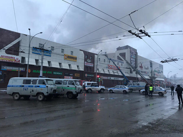 Rescue personnel is seen on a site of fire at a shopping mall in Kemerovo 