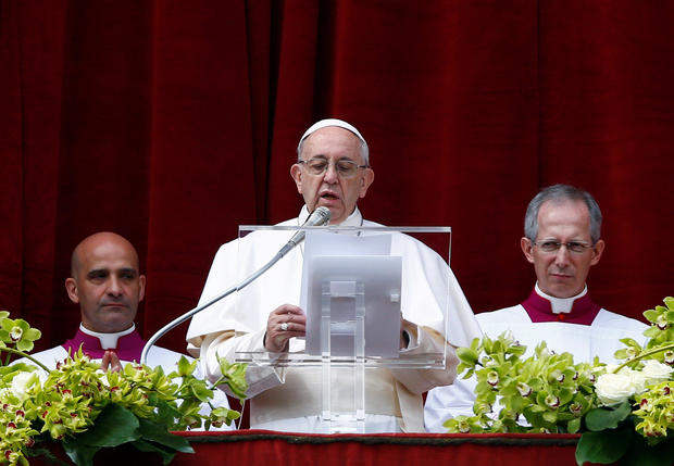 Pope Francis delivers his Easter message in the Urbi et Orbi (to the city and the world) address from the balcony overlooking St. Peter's Square at the Vatican 