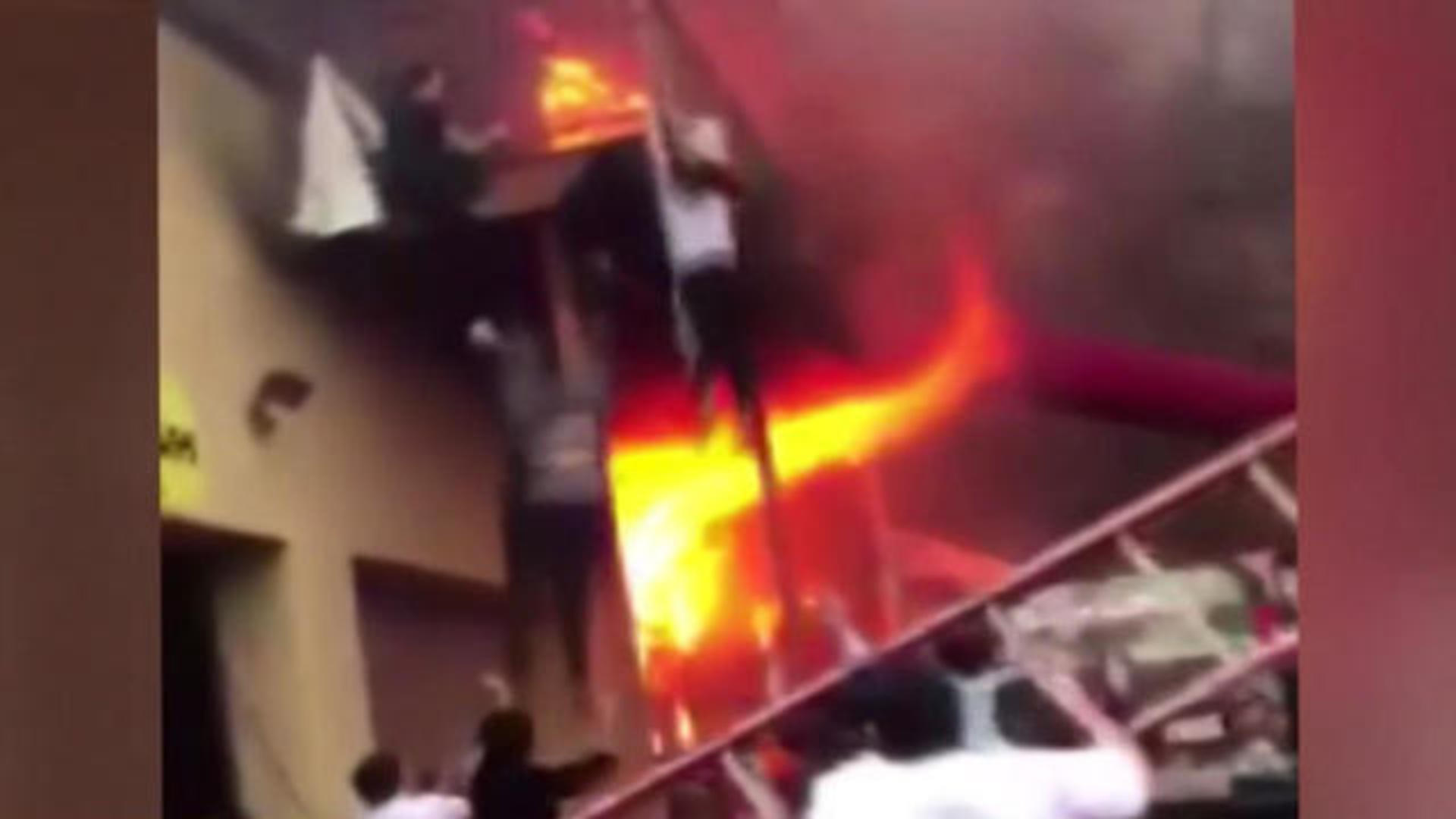 Girls jump from window of burning dance studio - CBS News