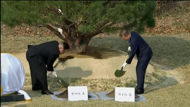 South Korean President Moon Jae-in and North Korean leader Kim Jong Un attend tree planting ceremony during the inter-Korean summit at the truce village of Panmunjom 