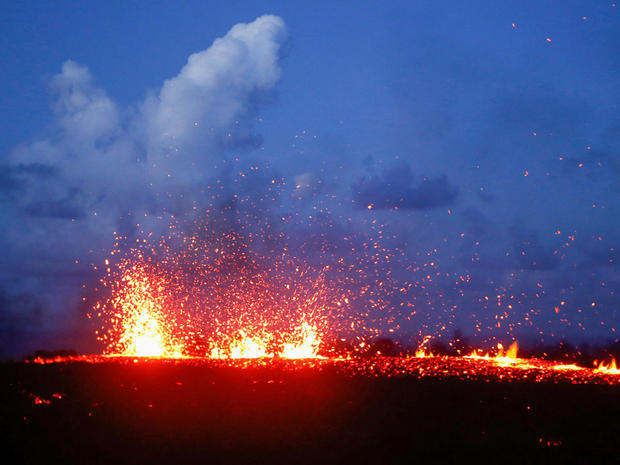 Lava erupts from a fissure on the outskirts of Pahoa 