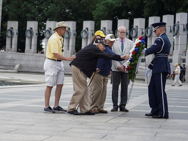Participants gather for a Memorial Day Observance at the World War II Memorial in Washington 