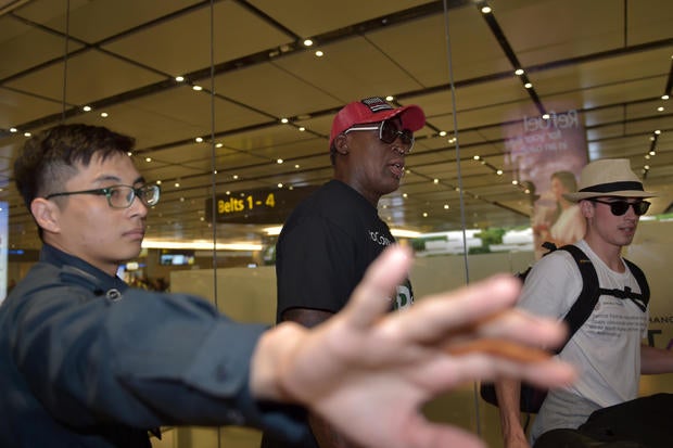 Retired American professional basketball player Dennis Rodman arrives at Changi International airport ahead of the U.S.-North Korea summit in Singapore on June 11, 2018.