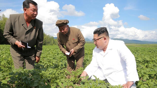 North Korea leader Kim Jong Un inspects the Junghung farm in Samjiyon county in this undated