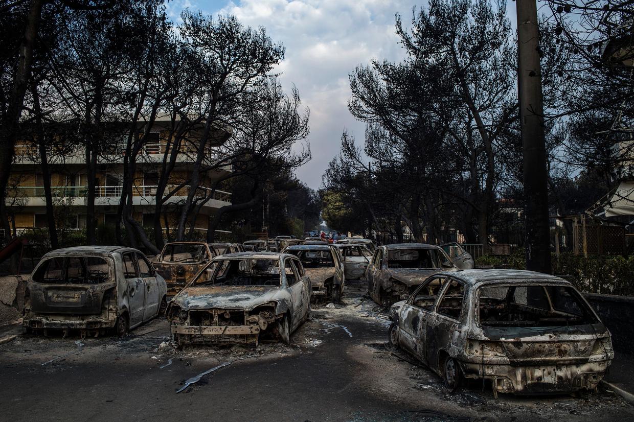 Greece wildfires Athens firefighters shocked to find charred victims