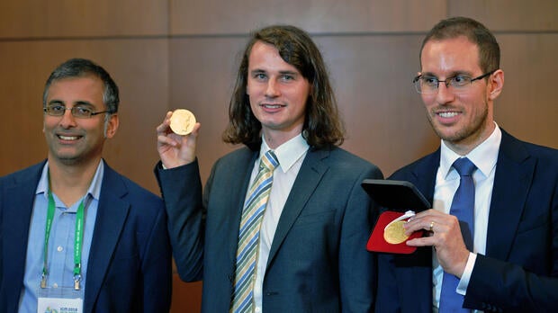 From left to right, Indian-Australian mathematician Akshay Venkatesh, German mathematician Peter Scholze and Italian mathematician Alessio Figalli, three of four winners of mathematics' prestigious Fields Medal, often known as the Nobel Prize for math, pose at the International Congress of Mathematicians in Rio de Janeiro, Brazil, on Aug. 1, 2018.