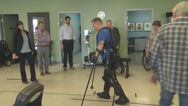 Robotic exoskeletons Helping paraplegics walk again CBS News