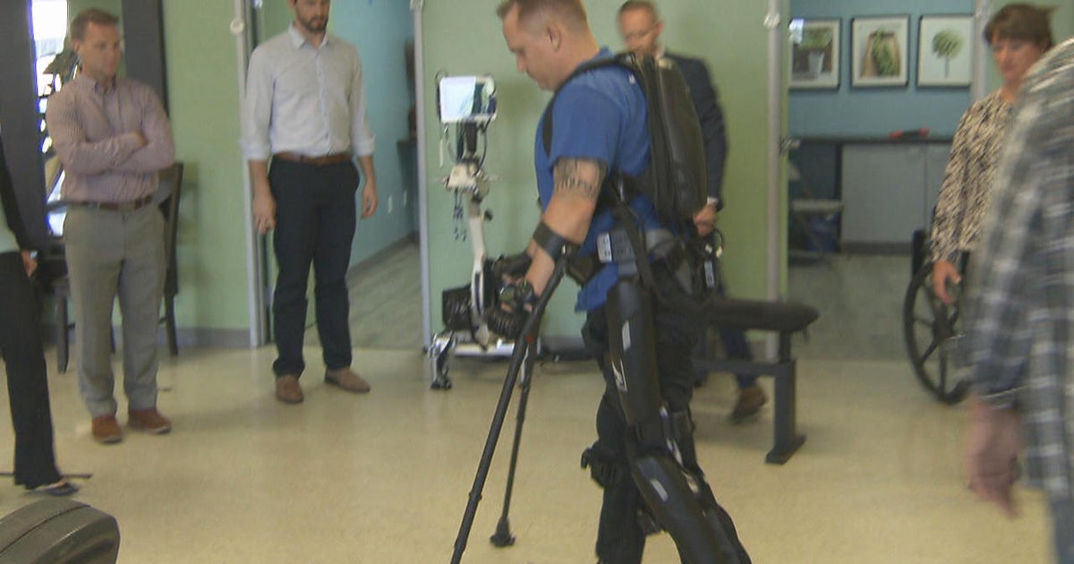 Robotic exoskeletons Helping paraplegics walk again CBS News