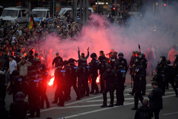 Right-wing supporters protest after a German man was stabbed last weekend in Chemnitz 