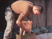washboards-servicemember-washes-clothes-promo.jpg