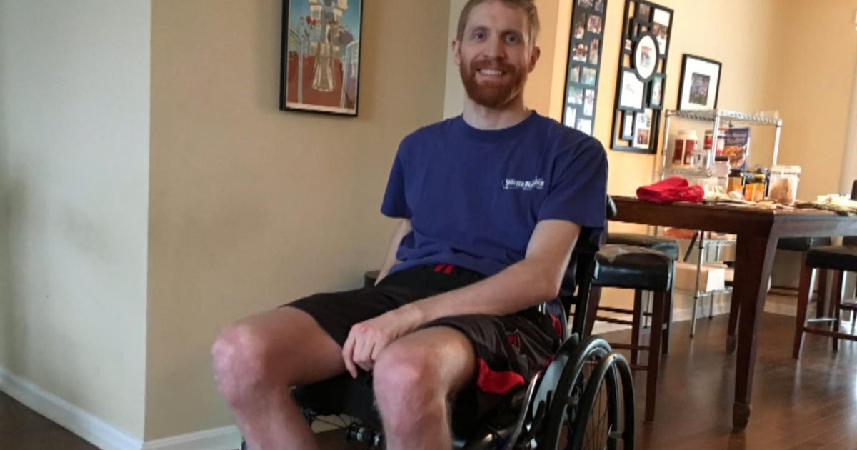 Experimental device helps paralyzed man walk the length of four football fields