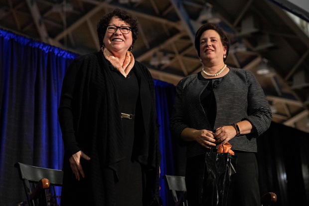 Associate Judges of the United States Supreme Court, Sonia Sotomayor and Elena Kagan, receive applause at the ceremony 