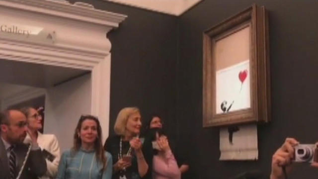 Banksy Painting Shredded Buyer Describes Her Reaction When Girl - banksy painting shredded buyer describes her reaction when girl with balloon artwork self destructed at auction cbs news