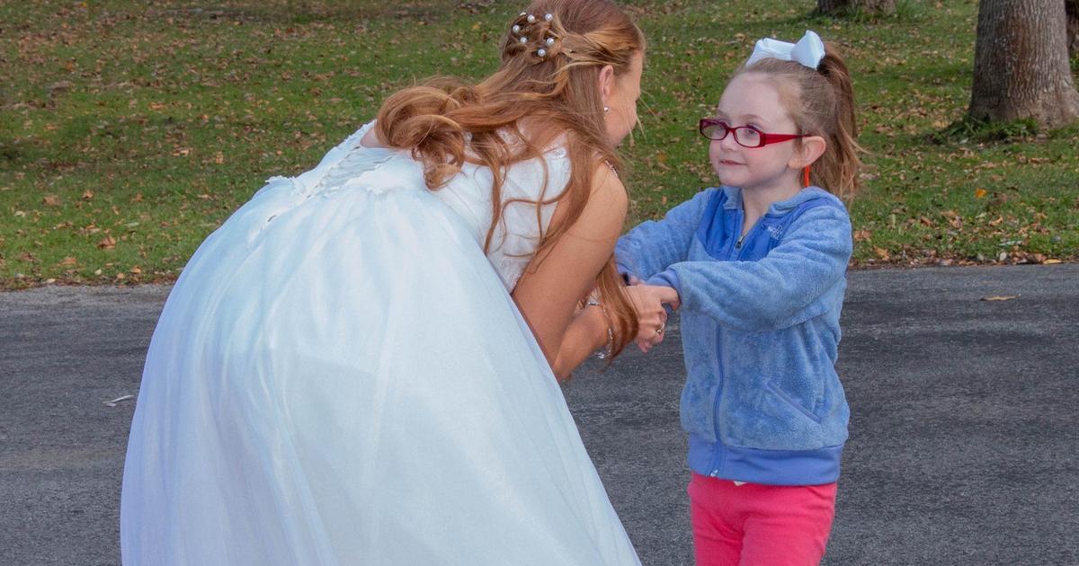 Image result for 5-year-old girl with autism mistakes bride for Cinderella, has magical moment with kind stranger