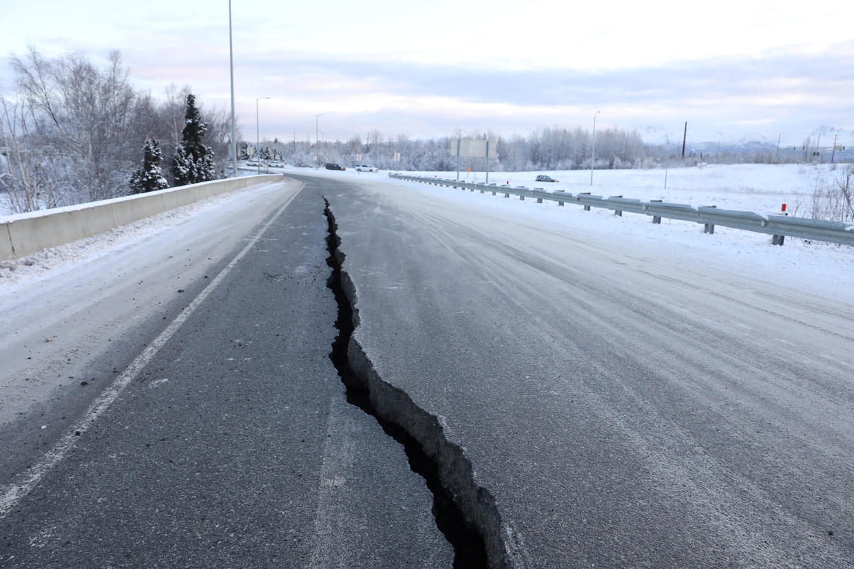 Surveying store damage Alaska earthquake and aftershocks Pictures