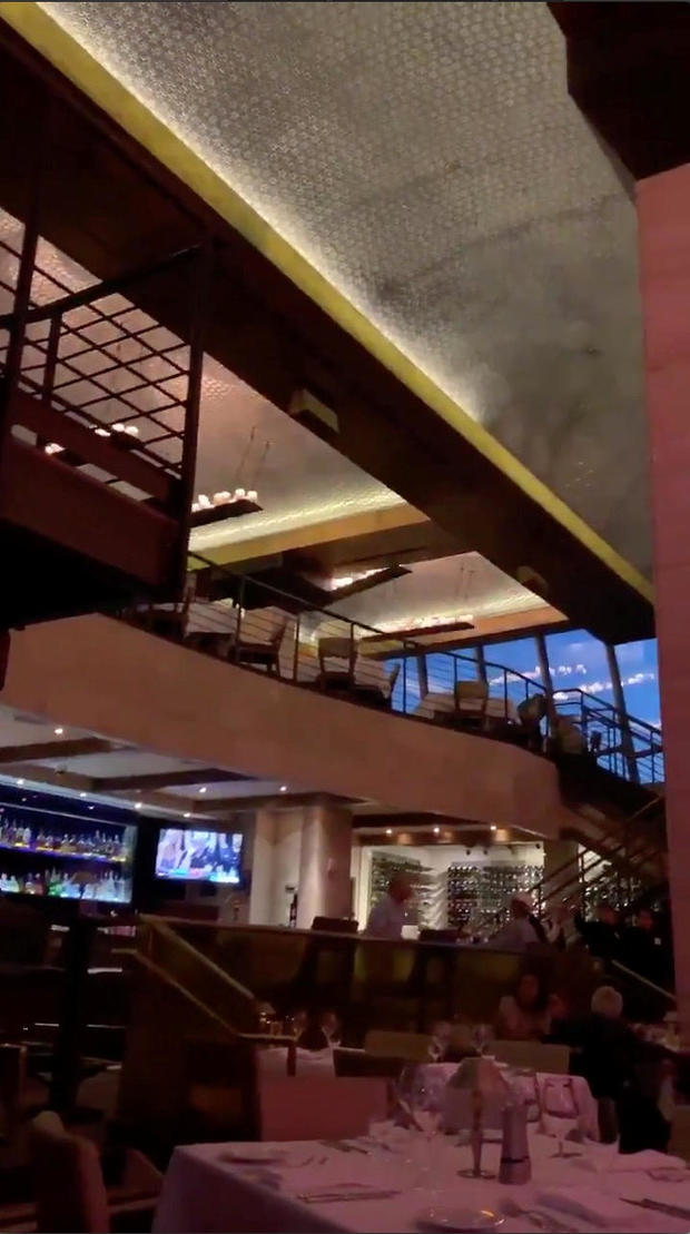 Ceiling lights in a restaurant sway during tremors felt in Palm Desert, California, U.S. during an earthquake that hit Southern California in this still frame taken from social media video dated July 5, 2019 