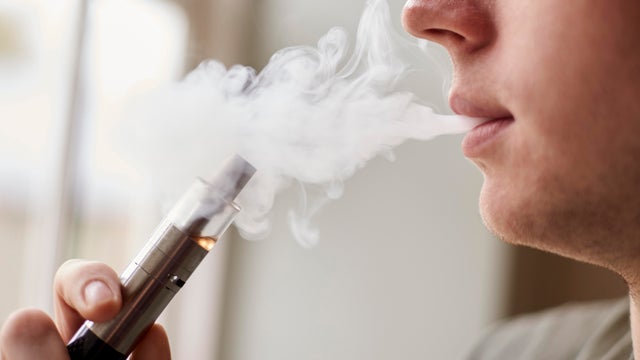 Close Up Of Man Vaping As Smoking Alternative