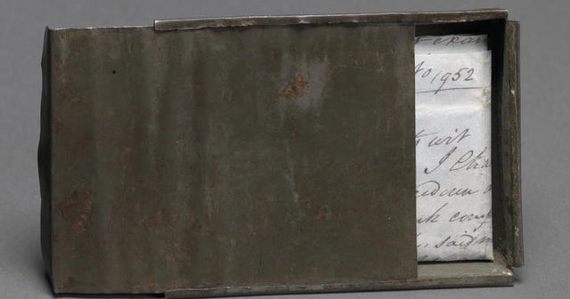 Smithsonian artifacts Tin wallet and freedom papers CBS News
