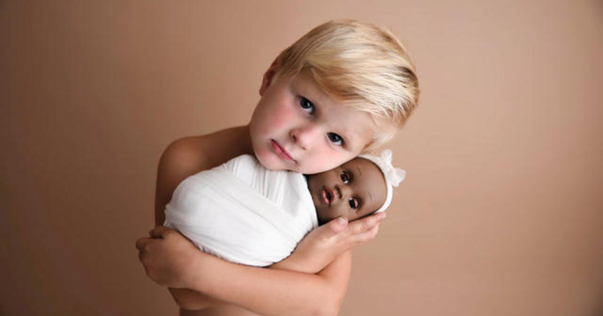 boy with doll