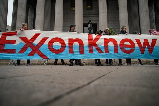 Environmental Activists Protest Outside Exxon Fraud Trial