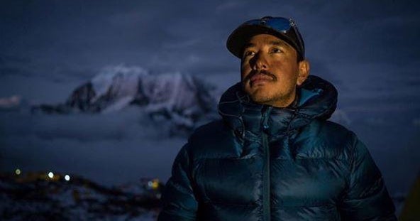 Former soldier breaks record for climbing world's highest peaks