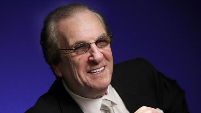 Actor Danny Aiello smiles while being photographed in New York October 7, 2011. 