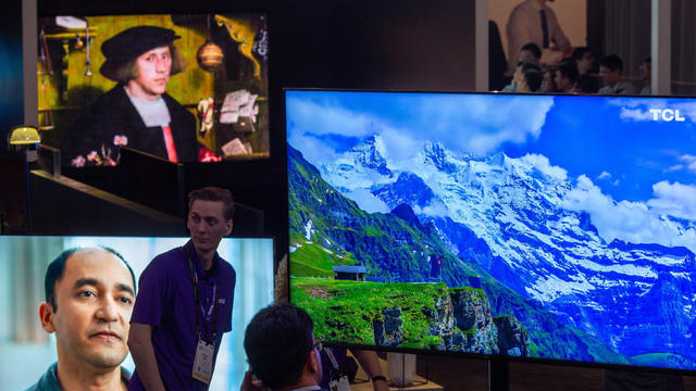 QLED 8K televisions are seen at the TCL exhibit at the the Las Vegas Convention Center during CES 2019 in Las Vegas on January 8, 2019. 