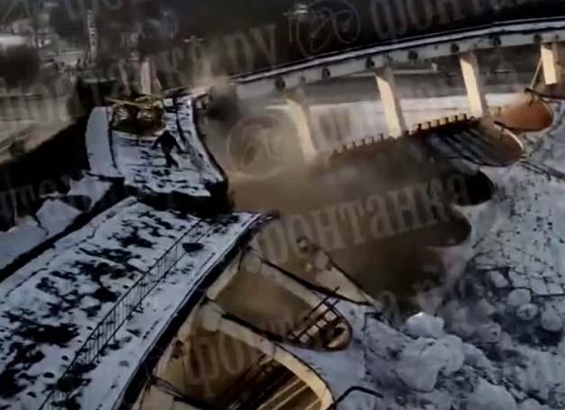 Dramatic video shows Russia stadium collapse with worker on roof CBS News