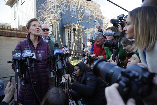 Senator Elizabeth Warren talks to reporters after telling her staff she is withdrawing from 2020 U.S. presidential race outside her home in Cambridge, Massachusetts 