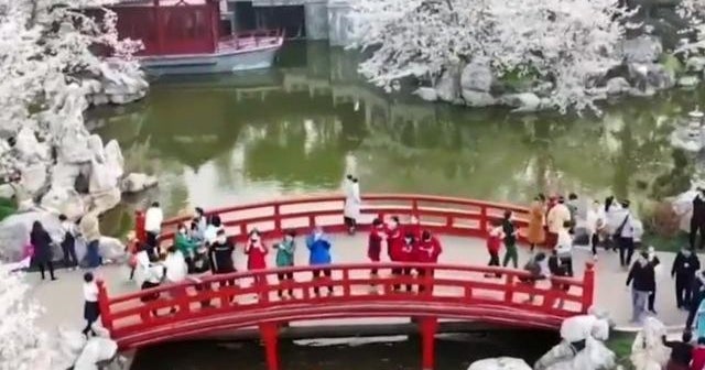 Wuhan residents celebrate, travel after coronavirus lockdown ends