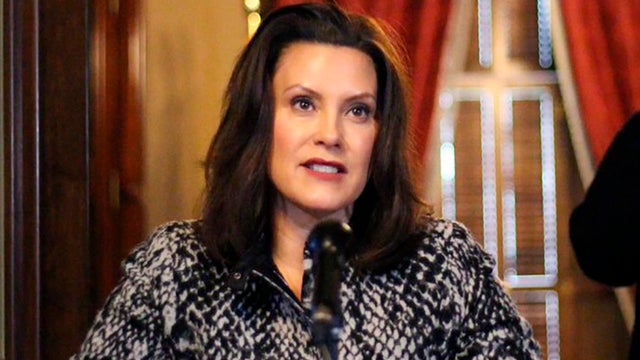 Michigan Governor Gretchen Whitmer addresses the state during a speech in Lansing, Michigan, April 13, 2020, in this image provided by the governor's office.