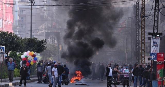 Protests erupt in Lebanon as coronavirus outbreak fuels ...