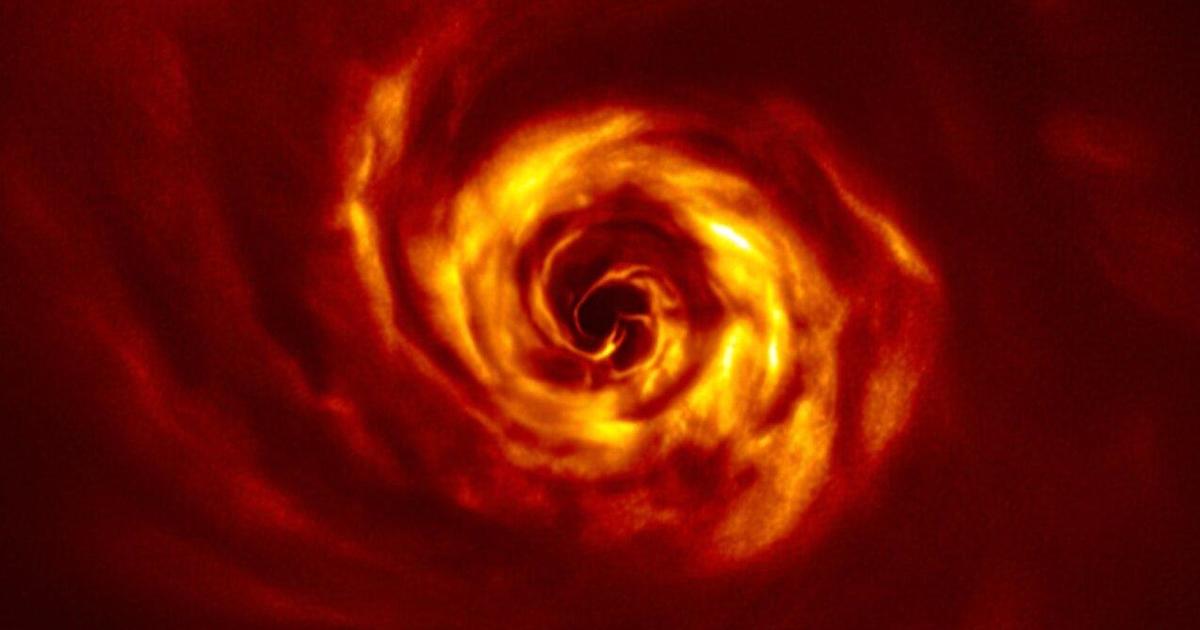 Stunning image of a cosmic spiral reveals what could be first glimpse at the birth of a planet - CBS News